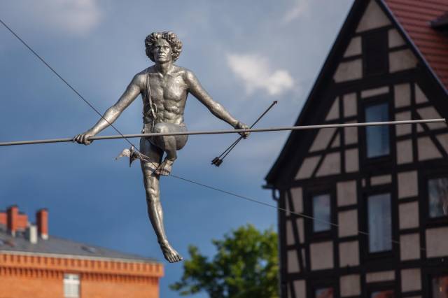 A Man crossing the River